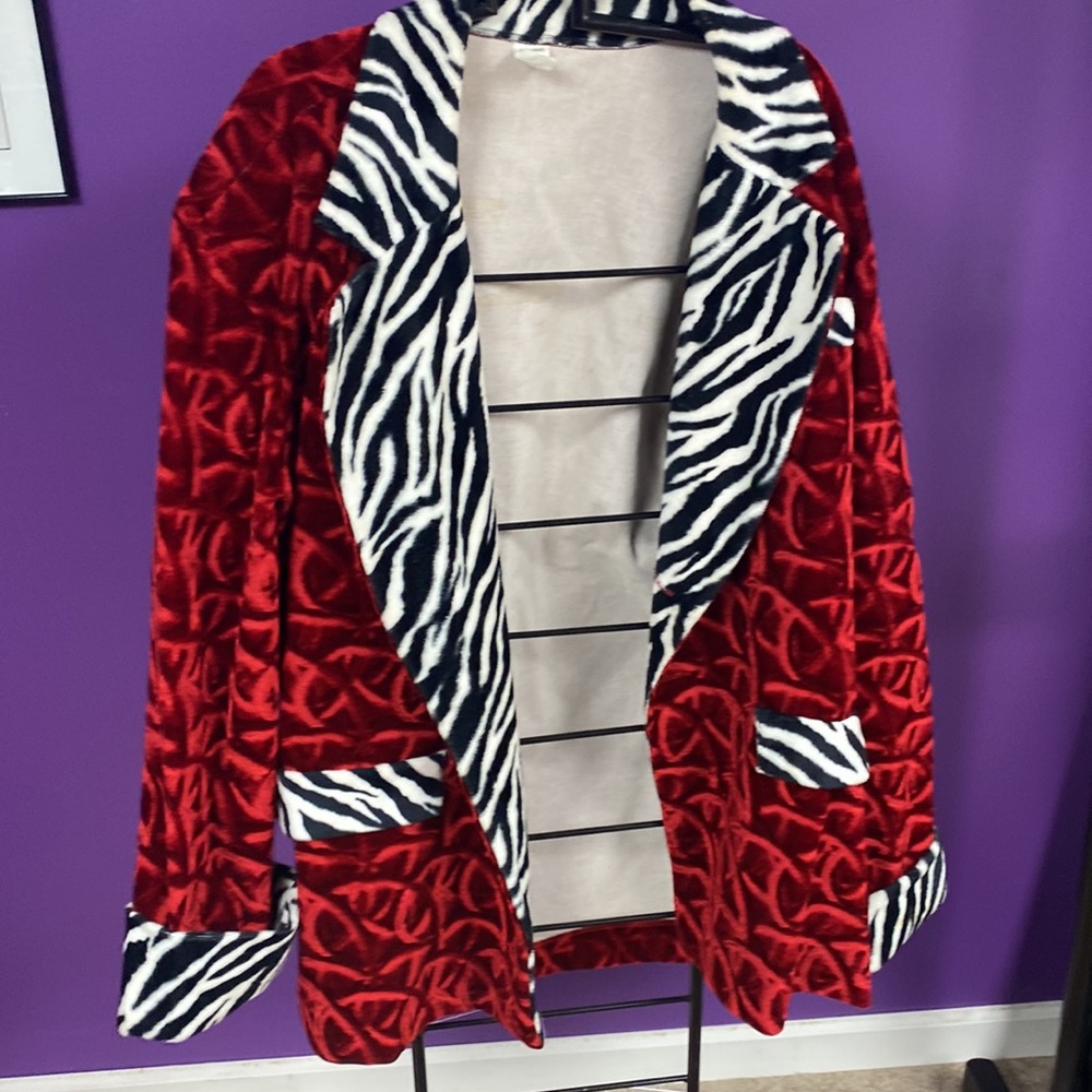 Red velvet looking sports coat with zebra trim